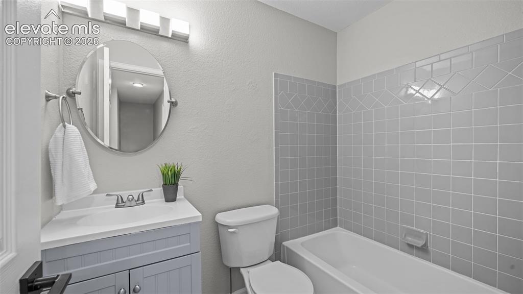 Image 17 of 32: Upstairs Bath