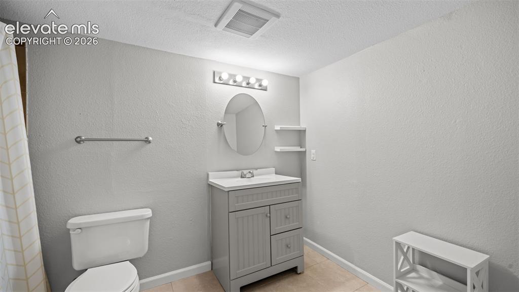 Image 29 of 32: Full Basement Bath
