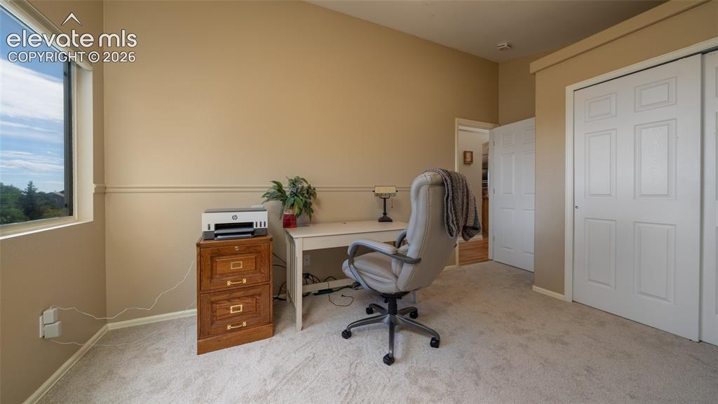 Image 19 of 42: Main level bedroom