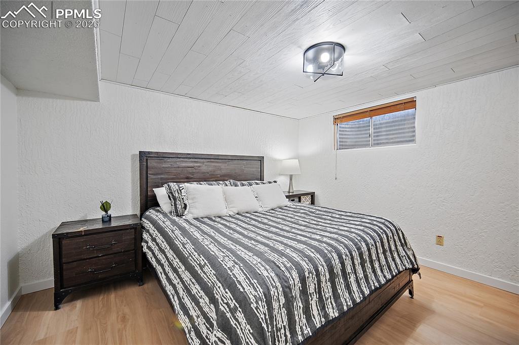 Image 29 of 44: Basement bedroom