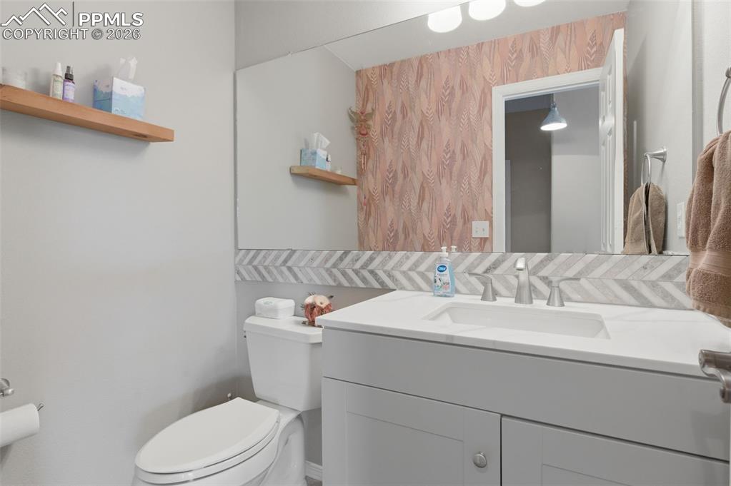 Image 13 of 50: Main level bathroom