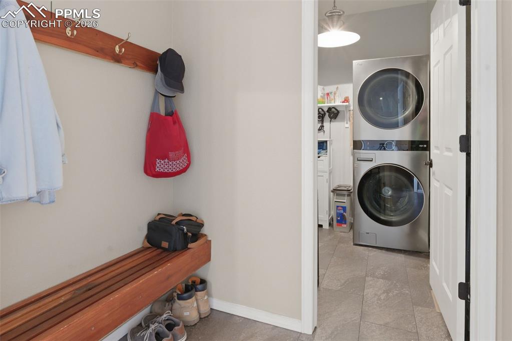 Image 14 of 50: Main level mud room adjoined to Laundry room