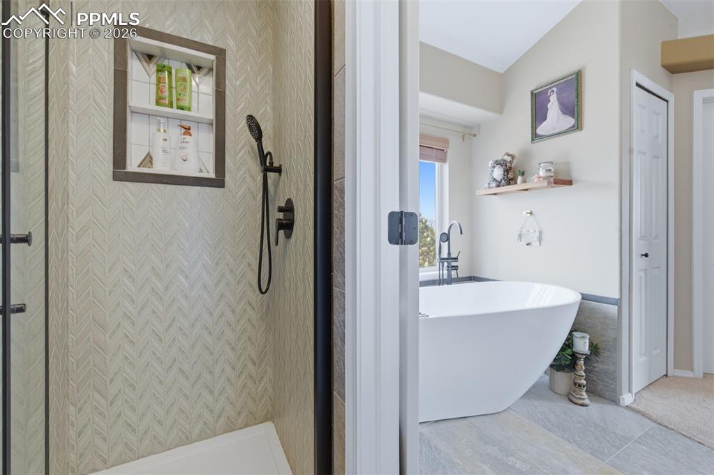 Image 18 of 50: Primary Spa and shower