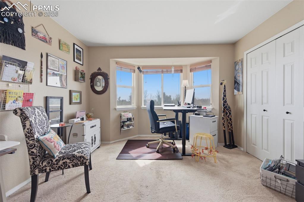 Image 21 of 50: Upper level office or bedroom