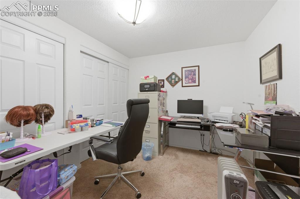 Image 29 of 50: Office room in basement