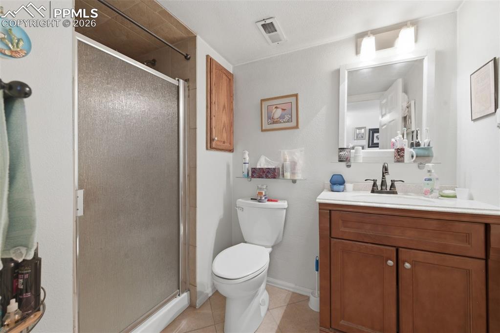 Image 30 of 50: Basement 3/4 bathroom