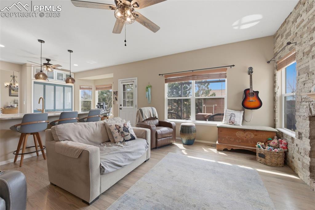 Image 9 of 50: Family room w/access to back deck