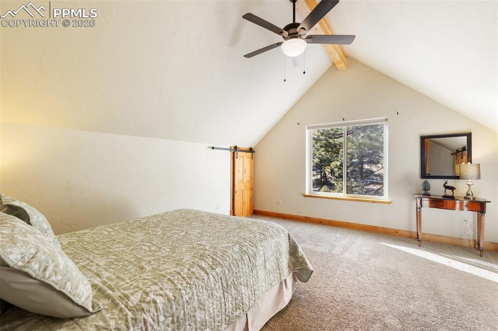 Image 35 of 43: Upper Level  Bedroom