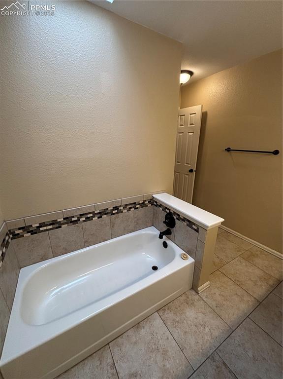 Image 12 of 34: Master Bathroom