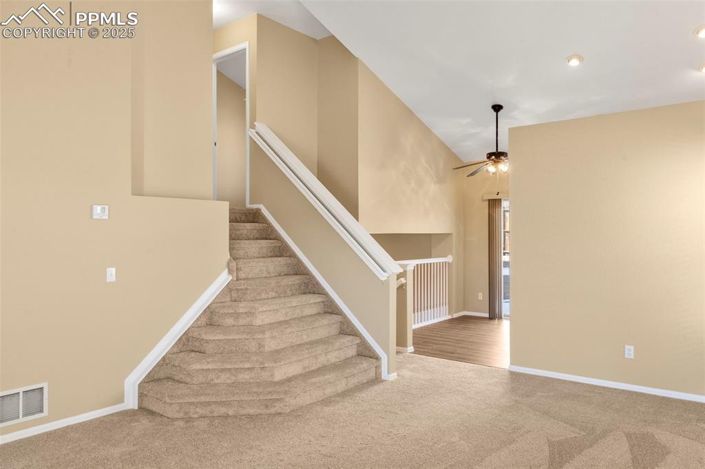 Image 7 of 25: Upper level stairs