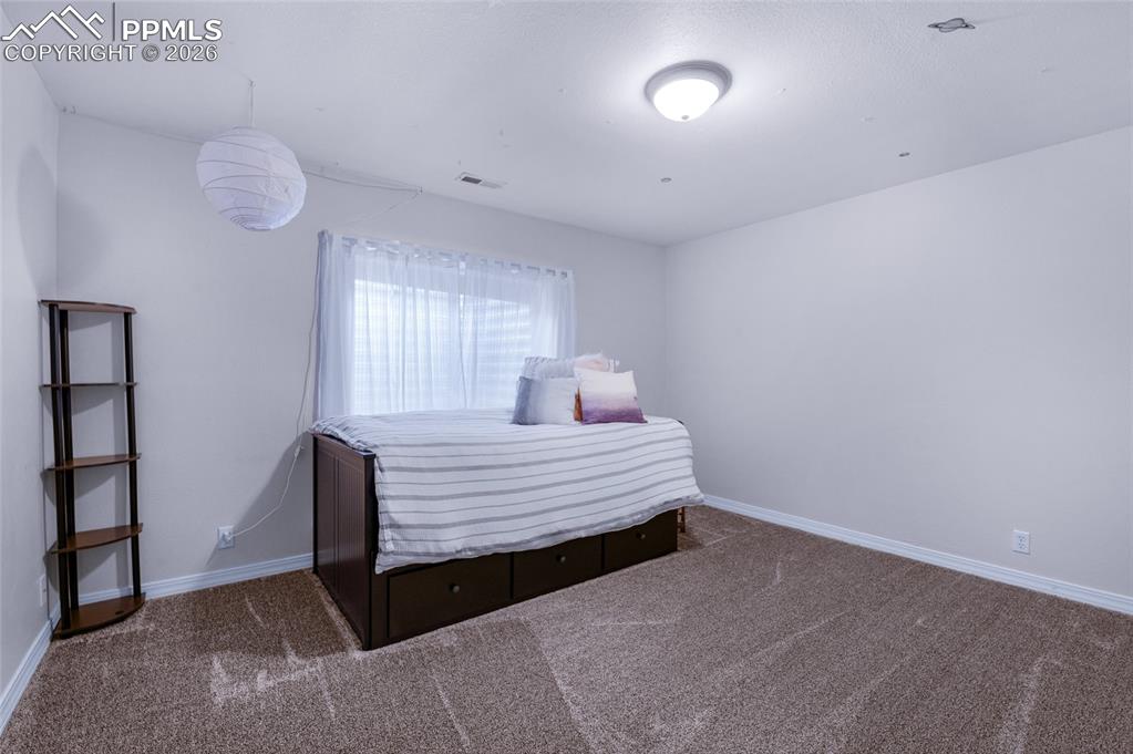 Image 28 of 48: Bedroom