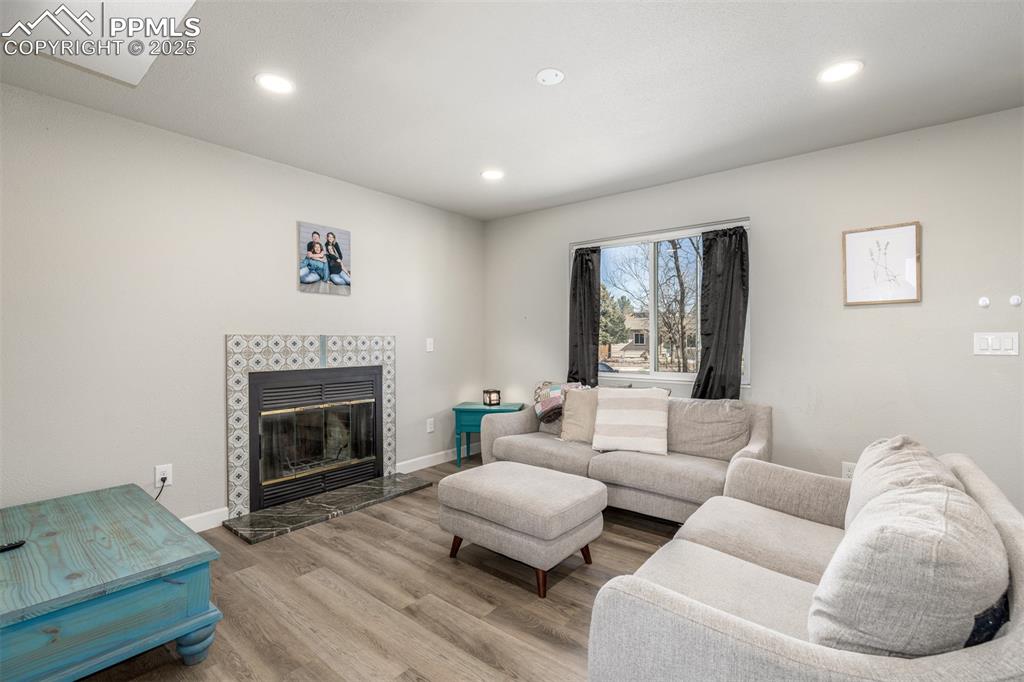 Image 3 of 28: As you enter the home, you are greeted by a lite and bright living room spa