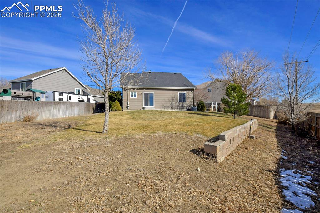 Image 25 of 27: Rear view of house
