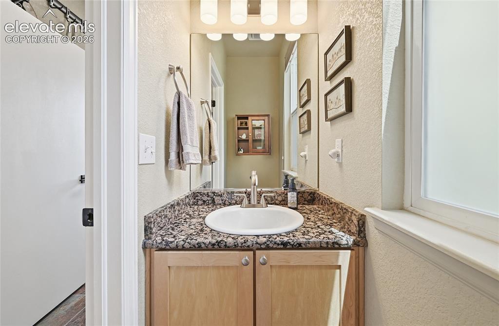 Image 15 of 49: Half Bath on Main Level