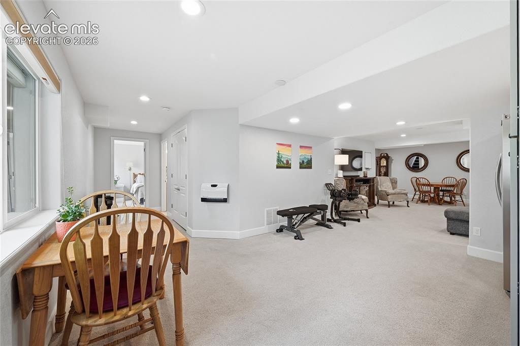 Image 36 of 49: Small eating area in Basement