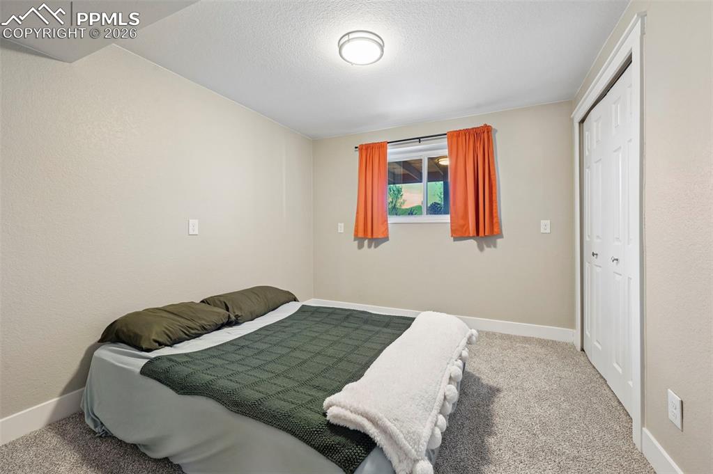 Image 32 of 36: Bedroom