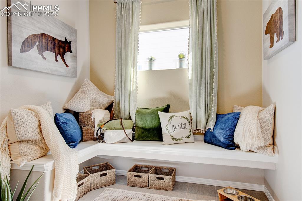 Image 12 of 23: Living area with baseboards