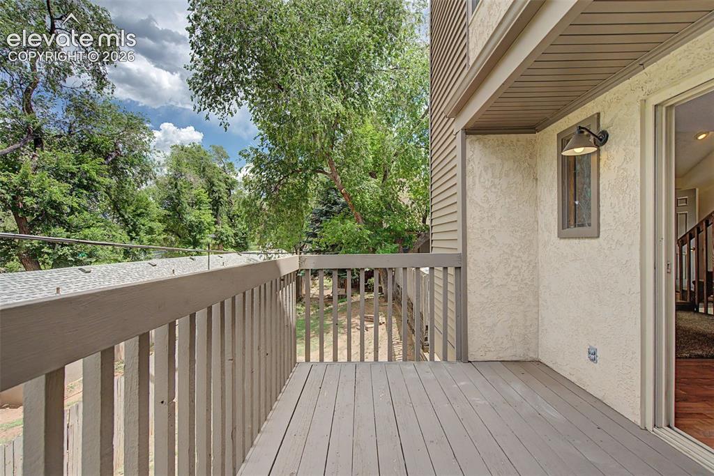 Image 19 of 30: Outdoor deck featuring wood-finish flooring and railing