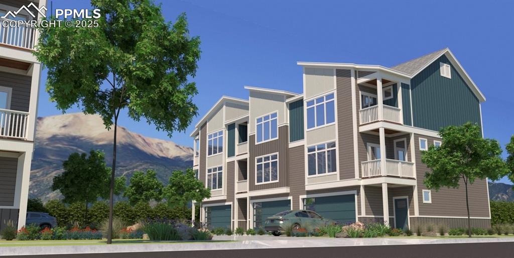 Image 4 of 4: View of building exterior with a mountain view