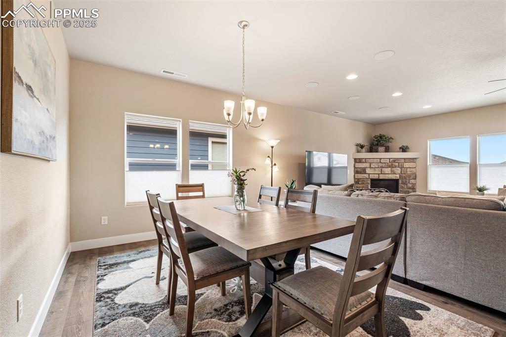 Image 12 of 49: Large dining space connected to the living room