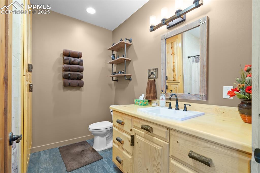 Image 25 of 40: Full bath featuring toilet and vanity