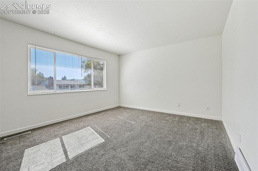 Image 13 of 27: Bright living room area 