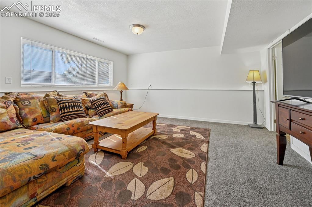 Image 16 of 27: Lower level family room 