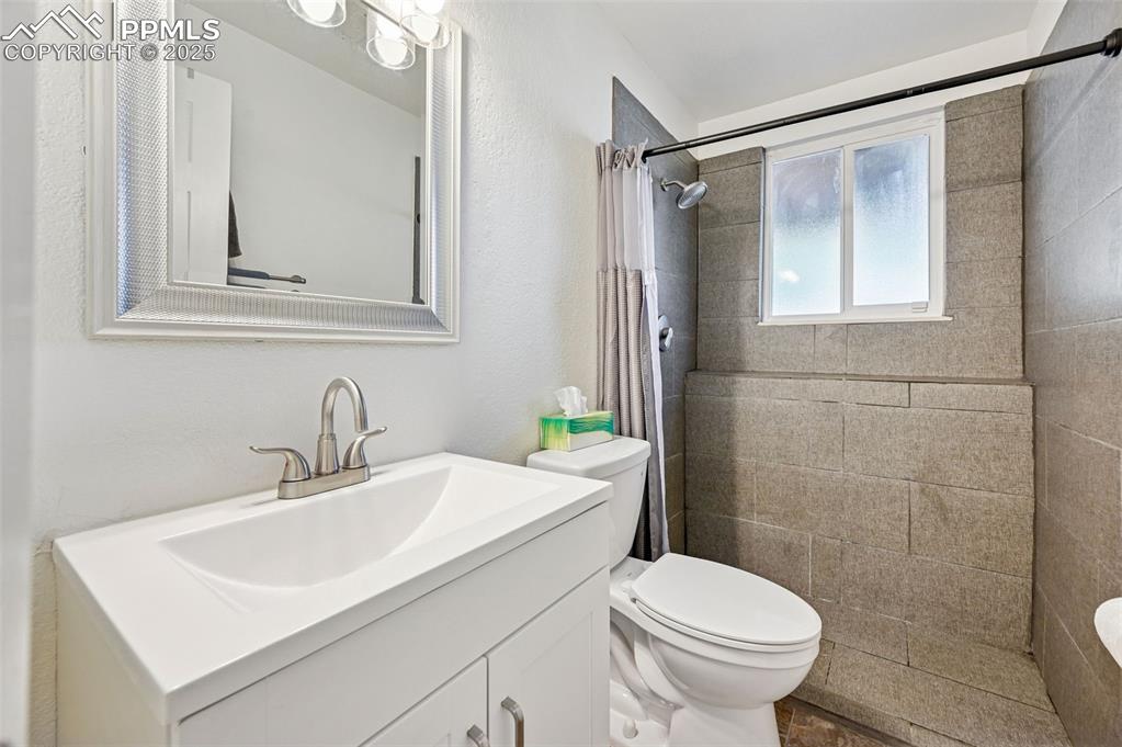 Image 26 of 27: 3/4 bath with walk in shower 