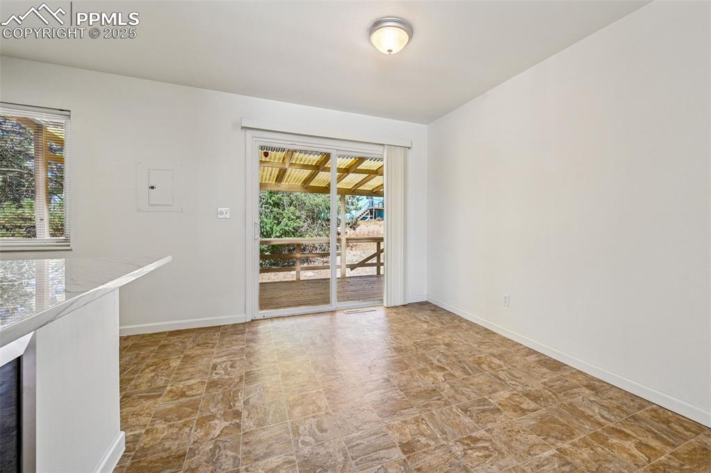 Image 9 of 27: Dining area with tons of natural lighting 