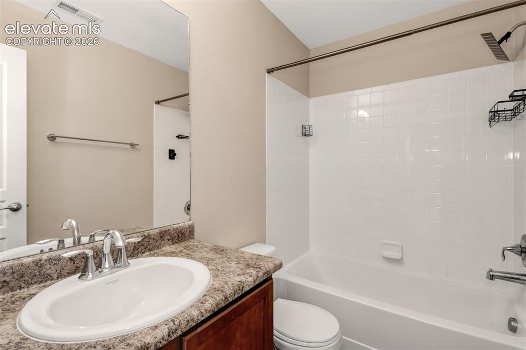 Image 20 of 22: Hall bathroom