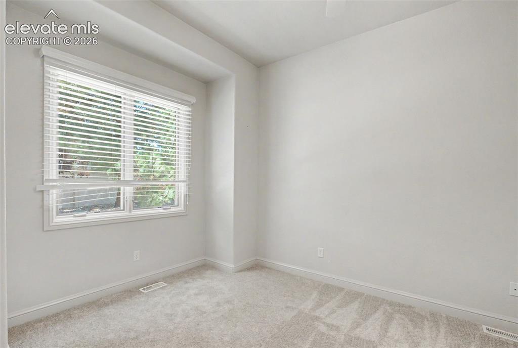 Image 21 of 46: Main level bedroom