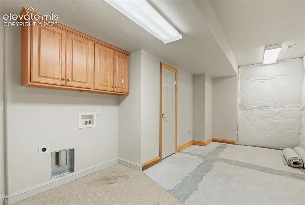 Image 37 of 46: Basement laundry/storage