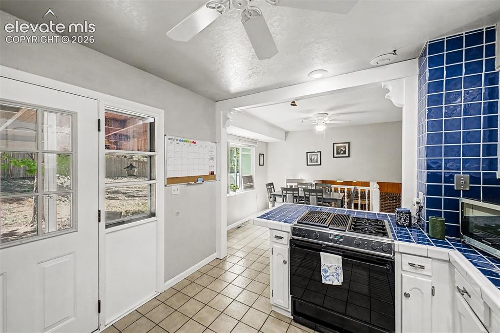 Image 11 of 44: Imagine breakfast with the family in your new kitchen and dining area. 