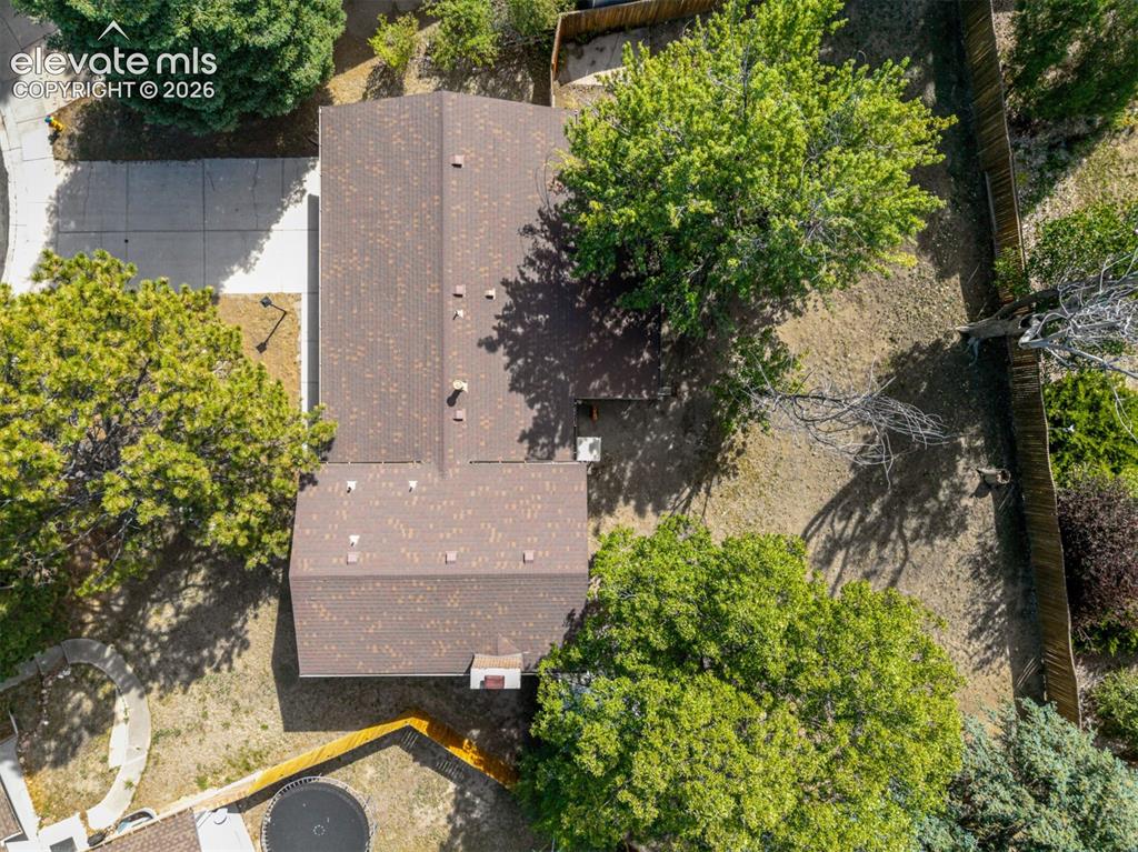 Image 33 of 44: Top down view of house and yard