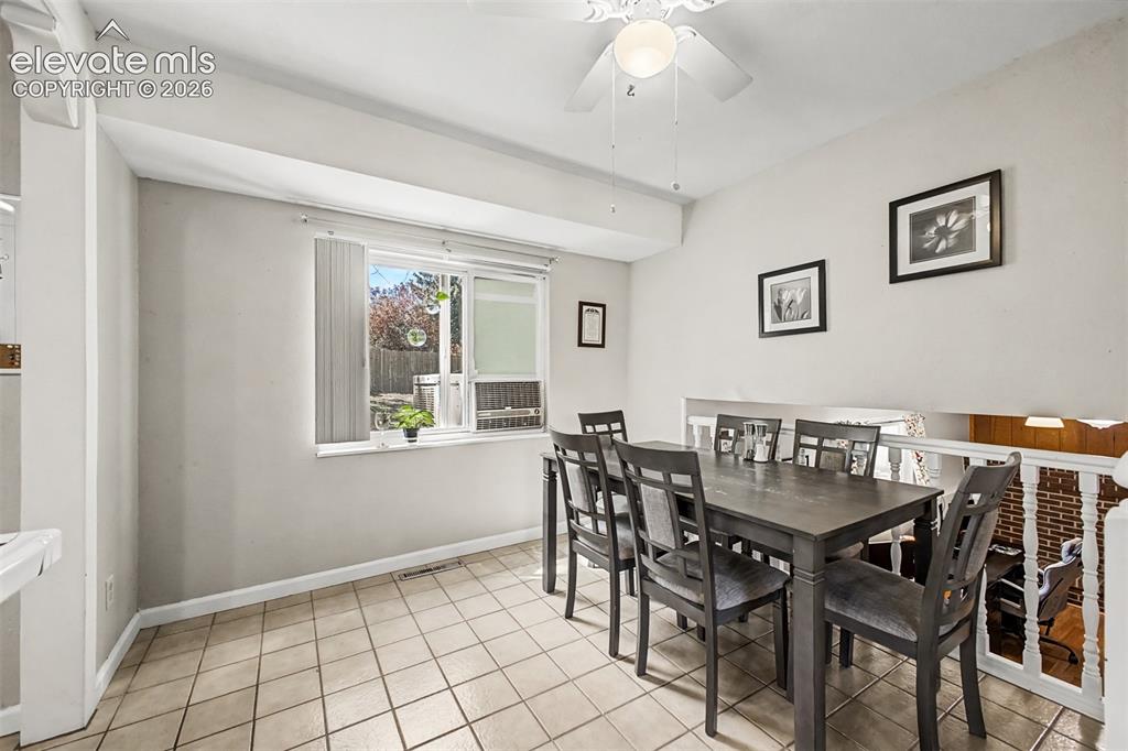 Image 7 of 44: Dining space offers natural lighting and easy access to both kitchen and fa