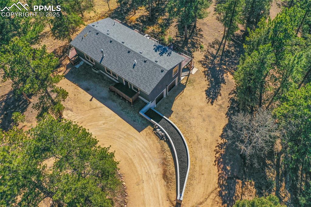 Caption: Aerial view of property and surrounding area