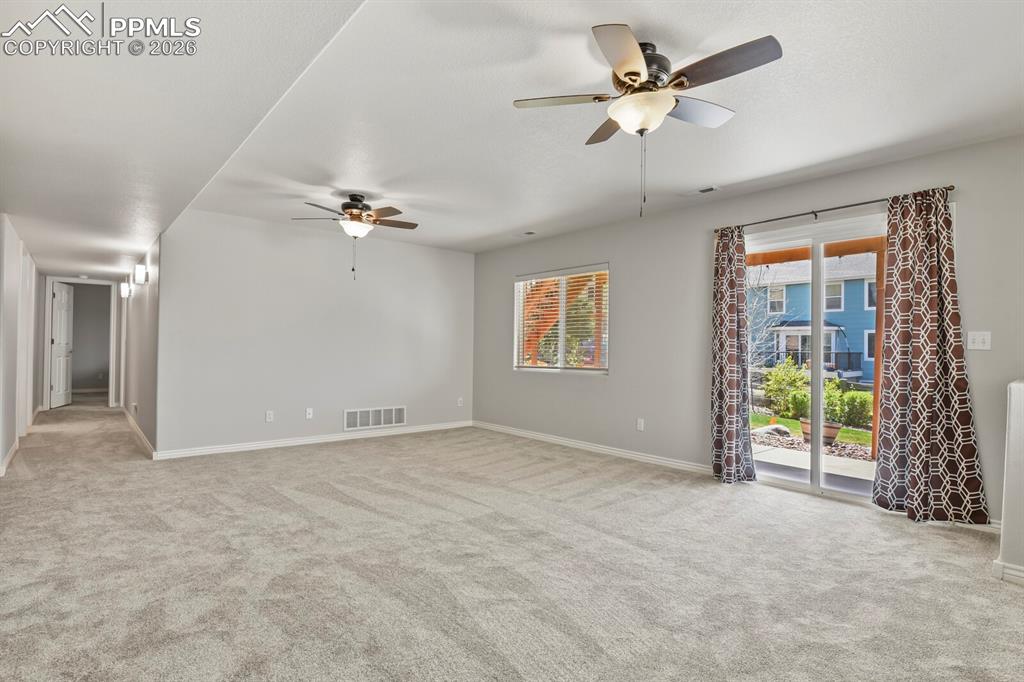 Image 24 of 45: Walk-out to patio and backyard!