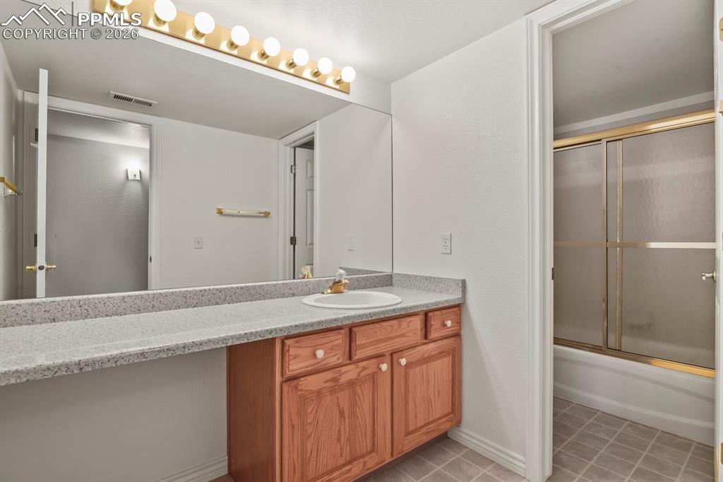 Image 27 of 45: Basement bath