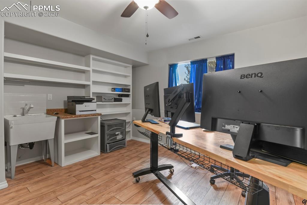 Image 35 of 45: or Bedroom
with shelving and sink!