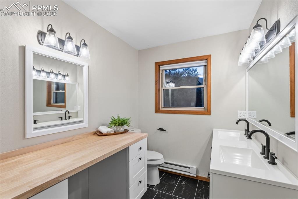 Image 33 of 40: Upper level Bathroom