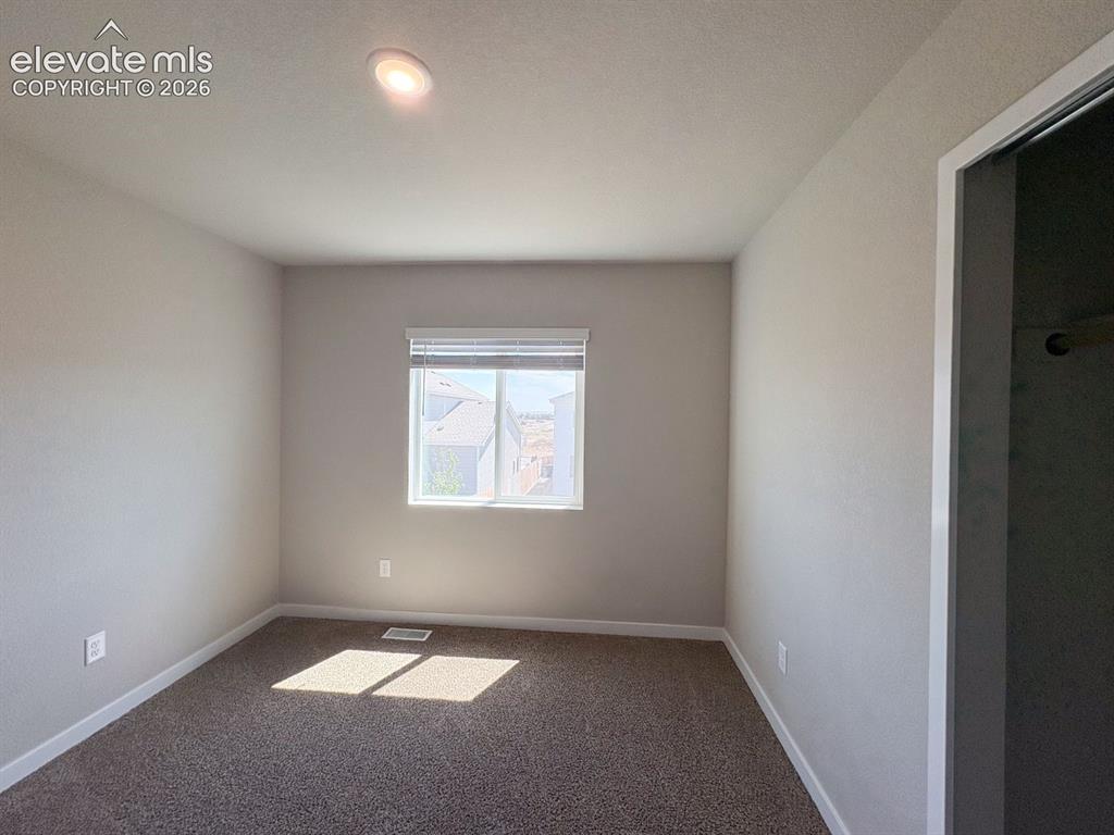 Image 10 of 25: Bedroom