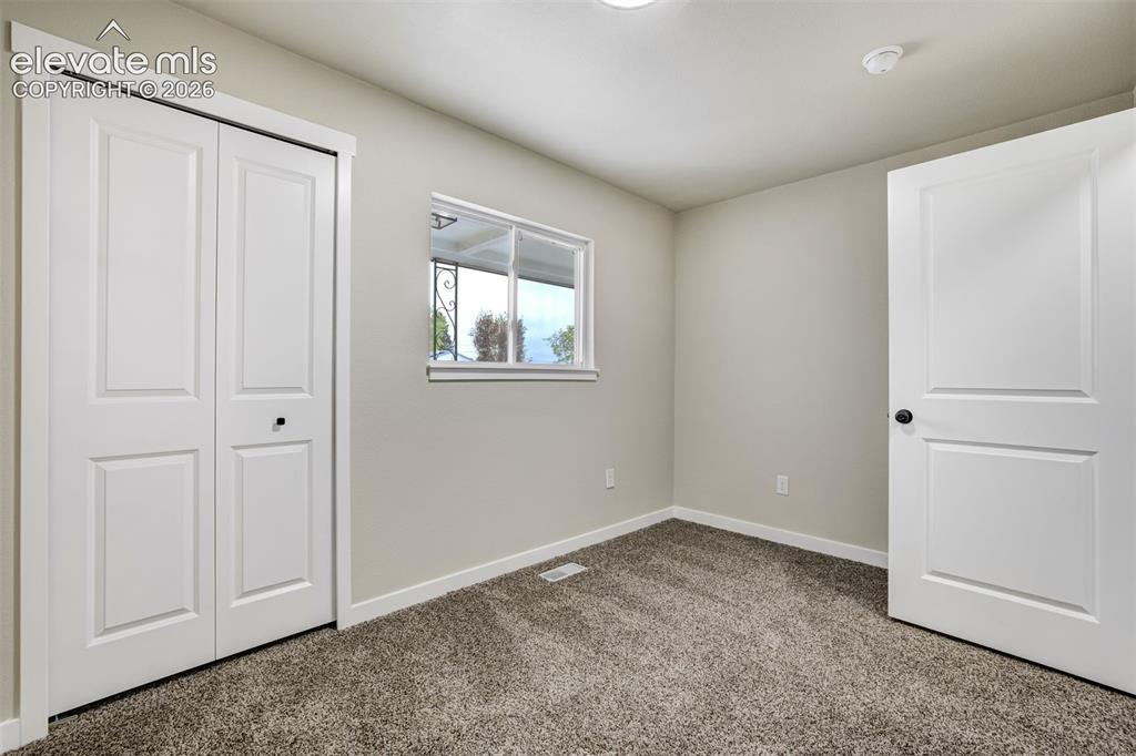 Image 17 of 33: Bedroom