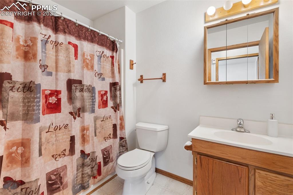Image 12 of 42: Hall Bathroom