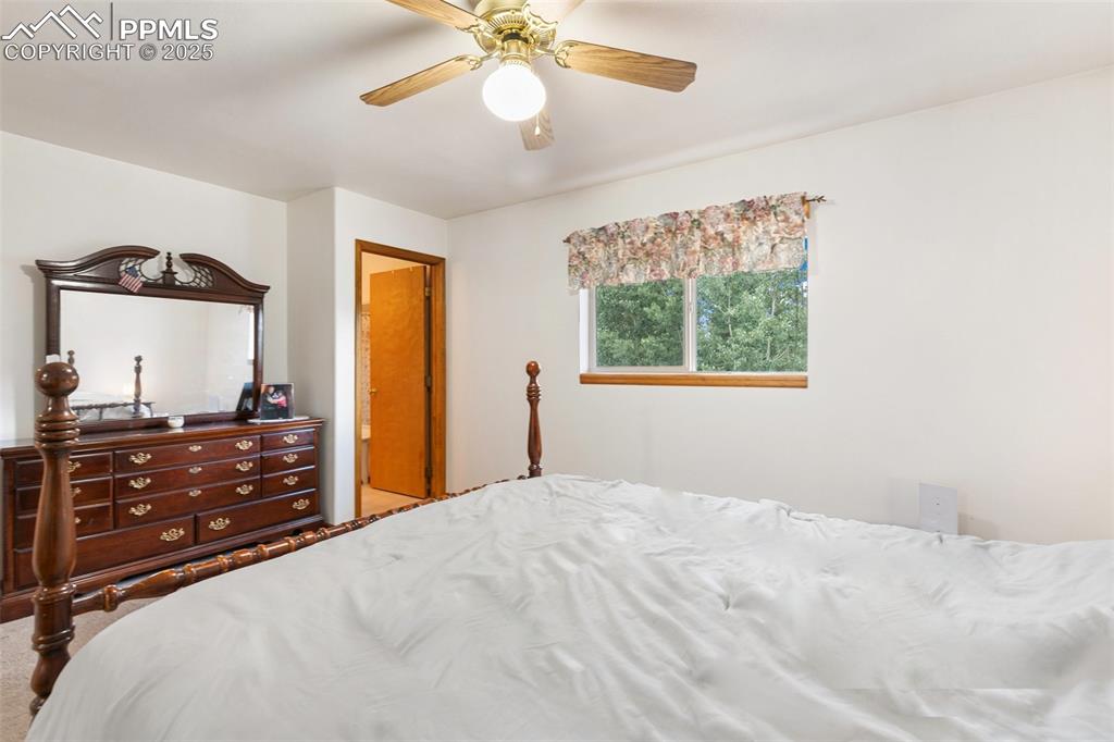Image 15 of 42: Master Bedroom with bathroom