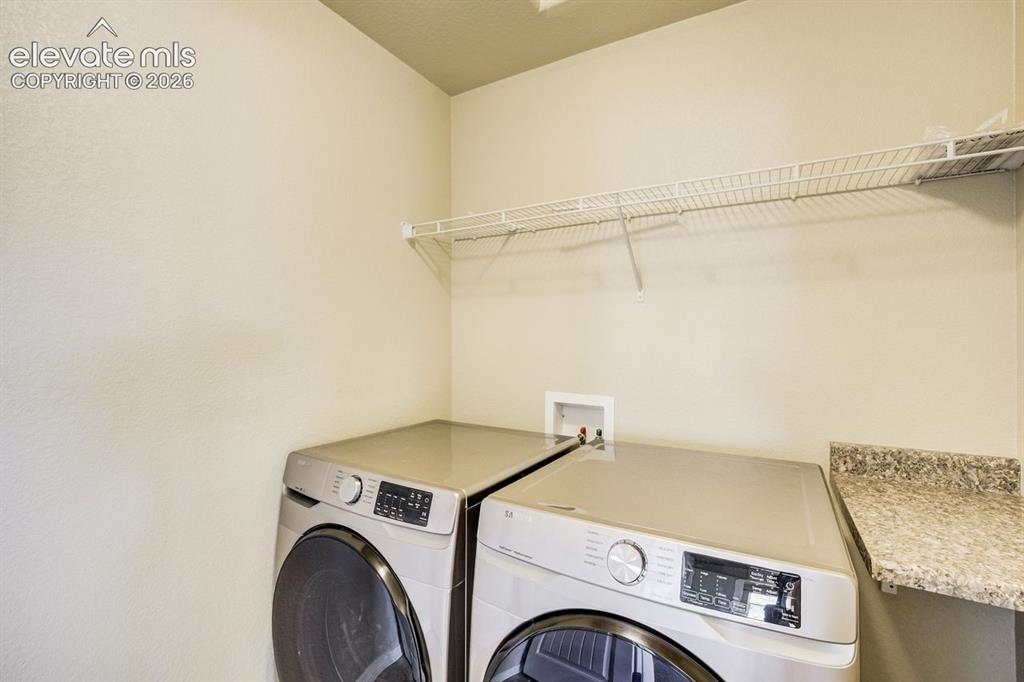Image 30 of 45: Upstairs Laundry room