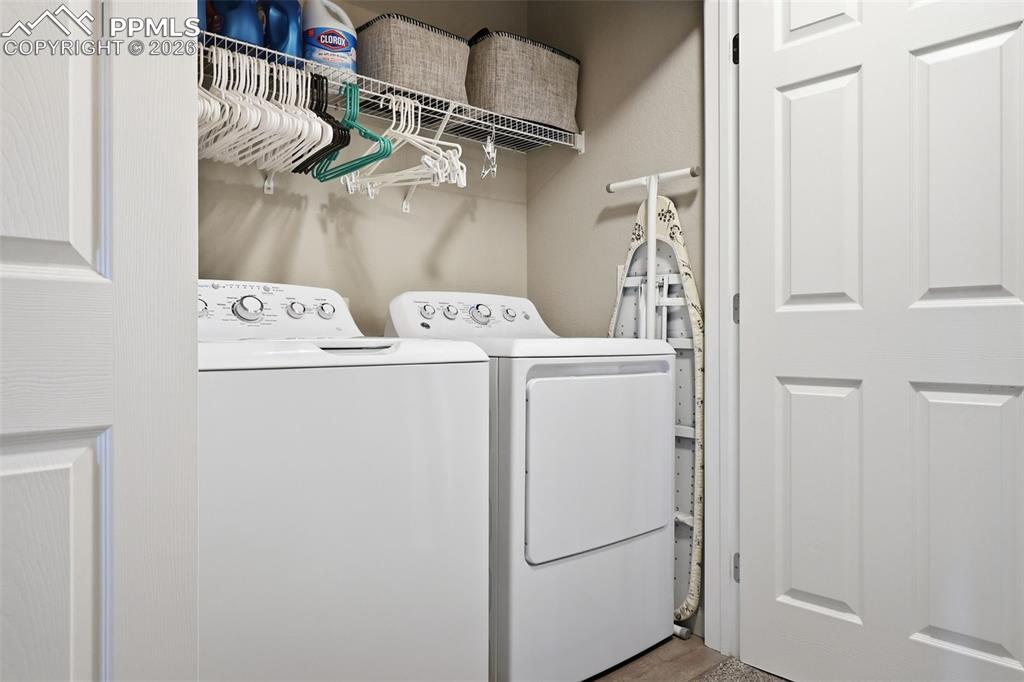 Image 27 of 32: Washer & Dryer are  included and located in the hallway