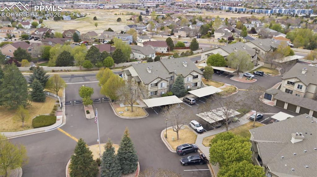 Image 30 of 32: Assigned carport parking space