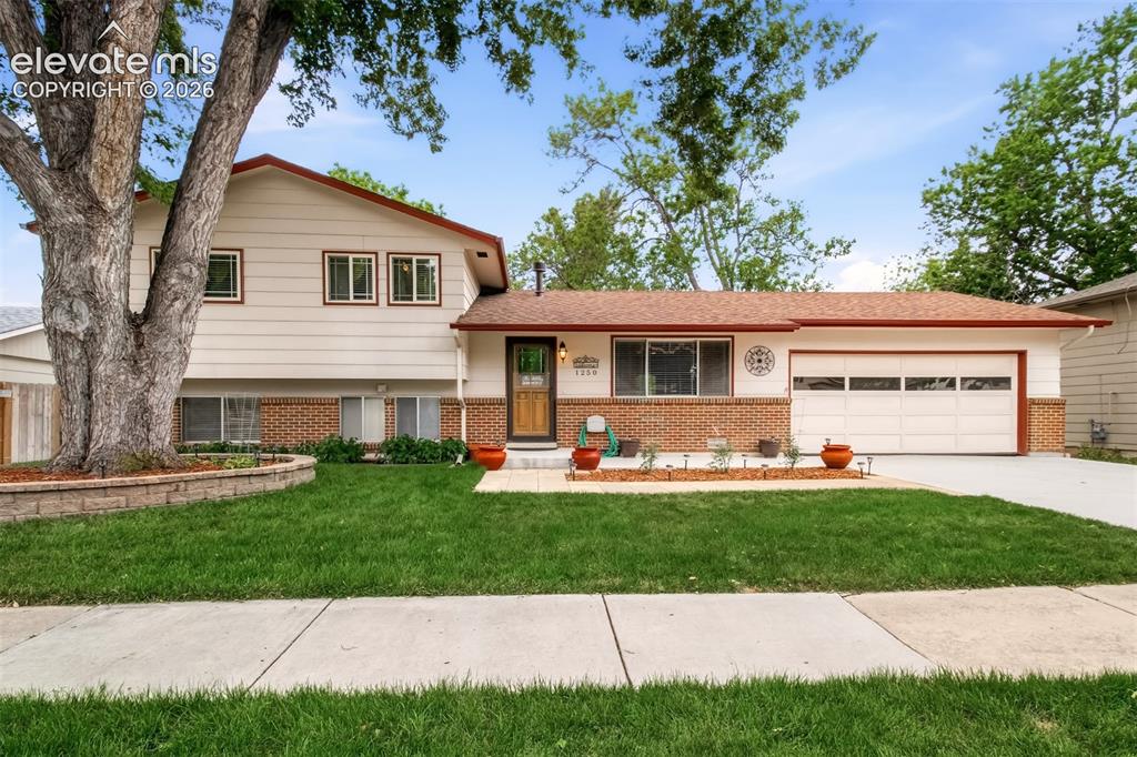 Image 1 of 30: Well-Maintained 4-Bedroom, 3-Bath, Walk-Out Tri-Level Home