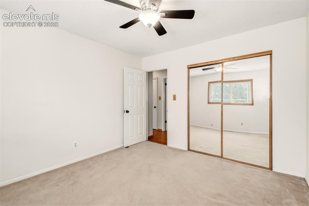 Image 14 of 30: Guest Bedroom, Hardwood Flooring In Hallway