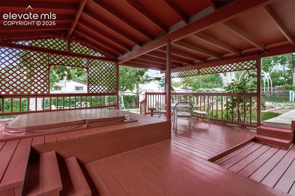 Image 2 of 30: Custom Covered Back Deck